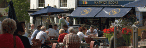 Outdoor cafe tables in Warwick Square